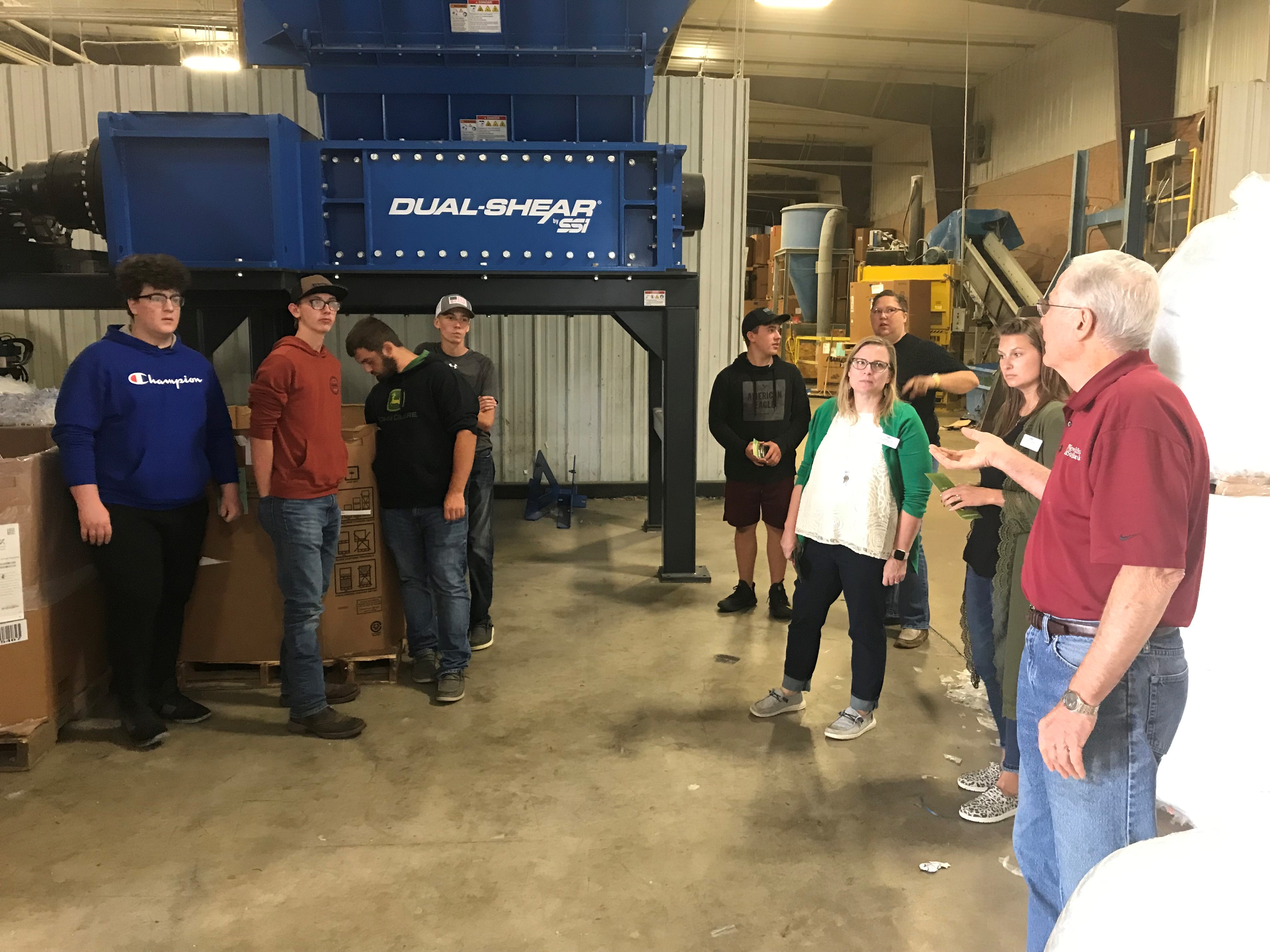 Students touring Plastic Recycling of Iowa Falls